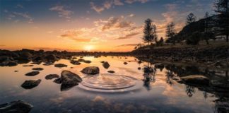 Nueva base de datos de agua dulce permite controlar la calidad de 12.000 lagos del mundo Lago de agua dulce al anochecer