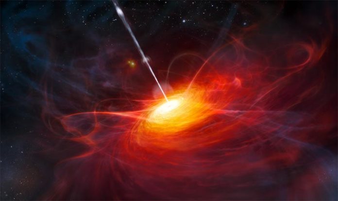 Representación artística del disco de acreción en ULAS J1120 + 0641, un cuásar rojo muy distante alimentado por un agujero negro supermasivo con una masa dos mil millones de veces la del Sol