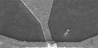 Dispositivo neuronal artificial reduce el uso de energía y el tamaño del hardware de una red neuronal Imagen de microscopio electrónico de barrido del dispositivo neuronal artificial