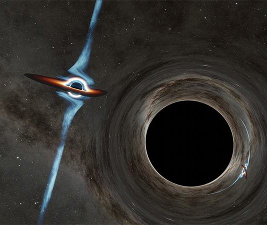 Dos agujeros negros supermasivos bailan en el corazón de una galaxia distante Este artista muestra su concepción de dos agujeros negros supermasivos candidatos en el corazón de un cuásar llamado PKS 2131-021