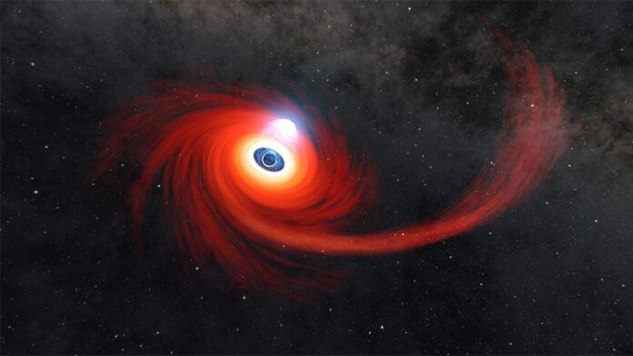 Un disco de gas caliente gira alrededor de un agujero negro en esta ilustración