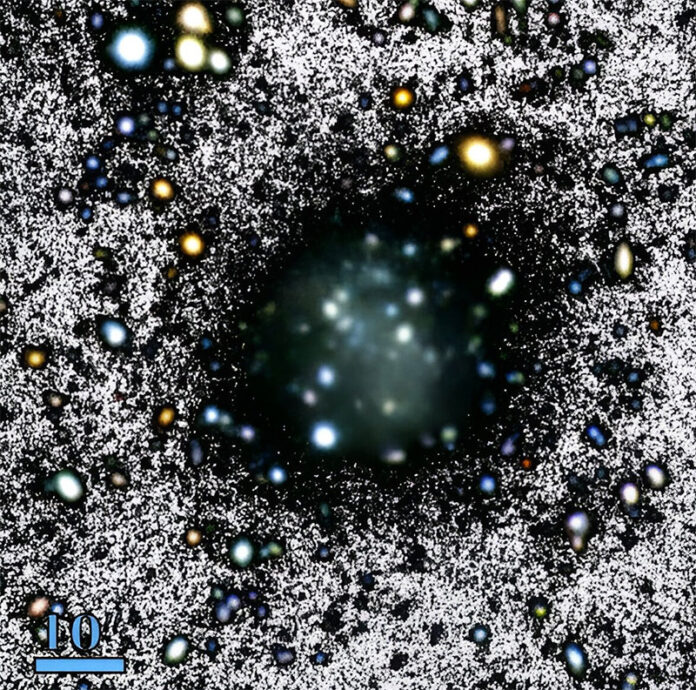 Una región de 100′′×100′′ alrededor de la galaxia casi oscura Nube Una región de 100′′×100′′ alrededor de la galaxia casi oscura Nube